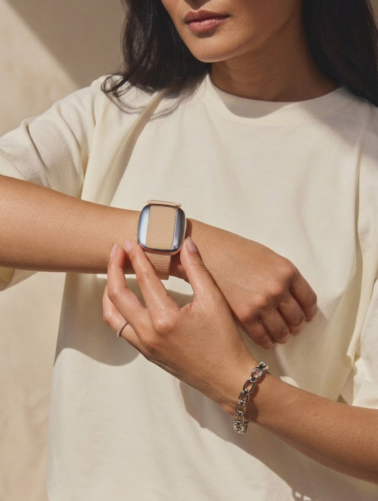Woman adjusting the Cooling Bracelet on her wrist