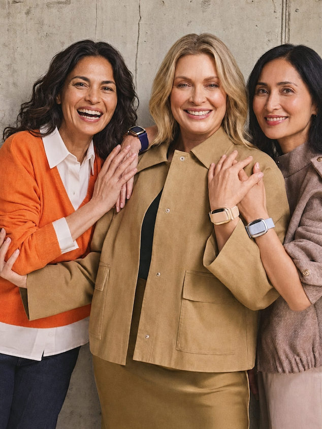 Three women wearing cooling bracelets
